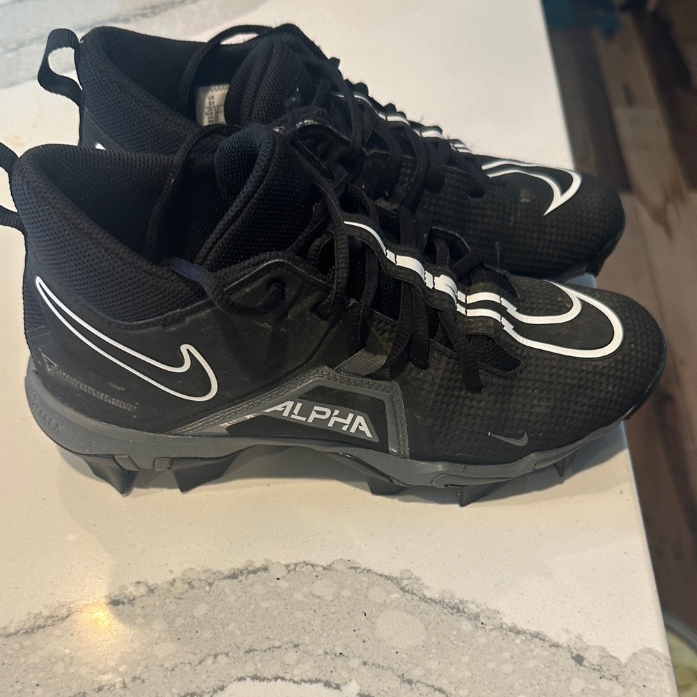 Nike Alpha Black and White Cleats Youth size 6Y